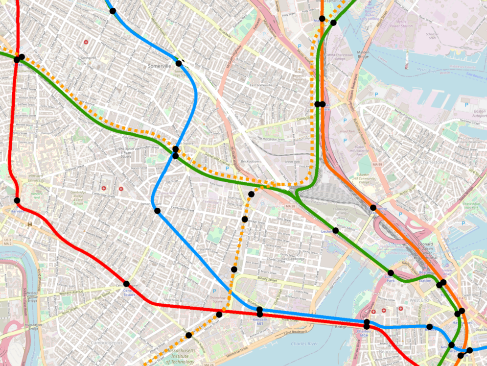 A map of the current MBTA rapid transit system, focused on eastern Cambridge and Somerville, showing the Blue Line extended from Bowdoin to Charles/MGH, across the Longfellow Bridge to Kendall/MIT, after which it turns north under Hampshire Street, to a station at Inman Square, and then to a station at Union Square, before meeting the alignment of the present-day GLX Medford Branch at Gilman Square, and carrying on from there; a dotted Gold Line indicates potential circumferential service to Sullivan from the Grand Junction line and from Porter Square; the Grand Junction branch of the Gold Line has stops at Twin City Plaza, Cambridge St, Binney St, Main St/Kendall, and Mass Ave/MIT